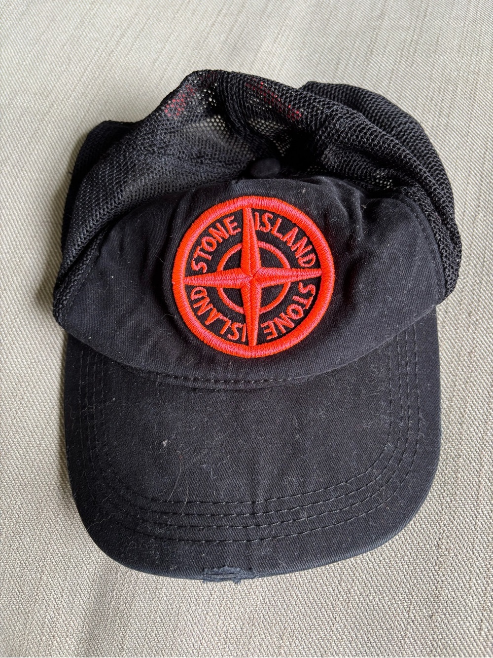 Destroyed / Distressed Stone Island Black Hat with Red/Pink Logo